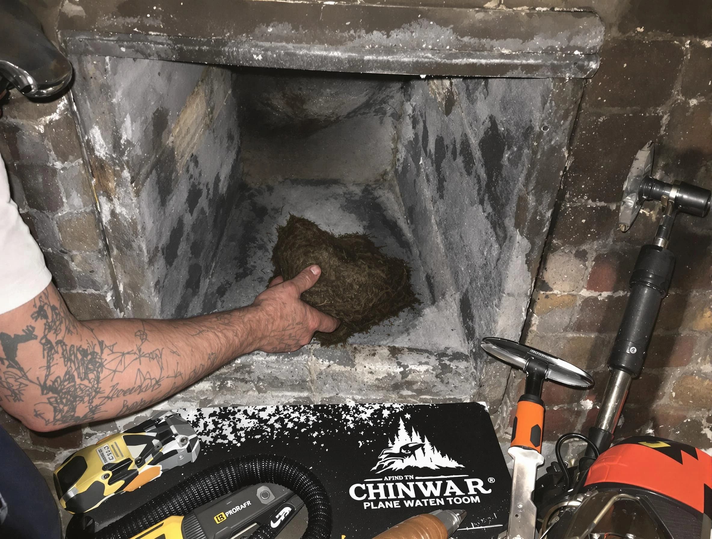 Livingston Chimney Sweep safely removing debris and screening chimney in Livingston, NJ