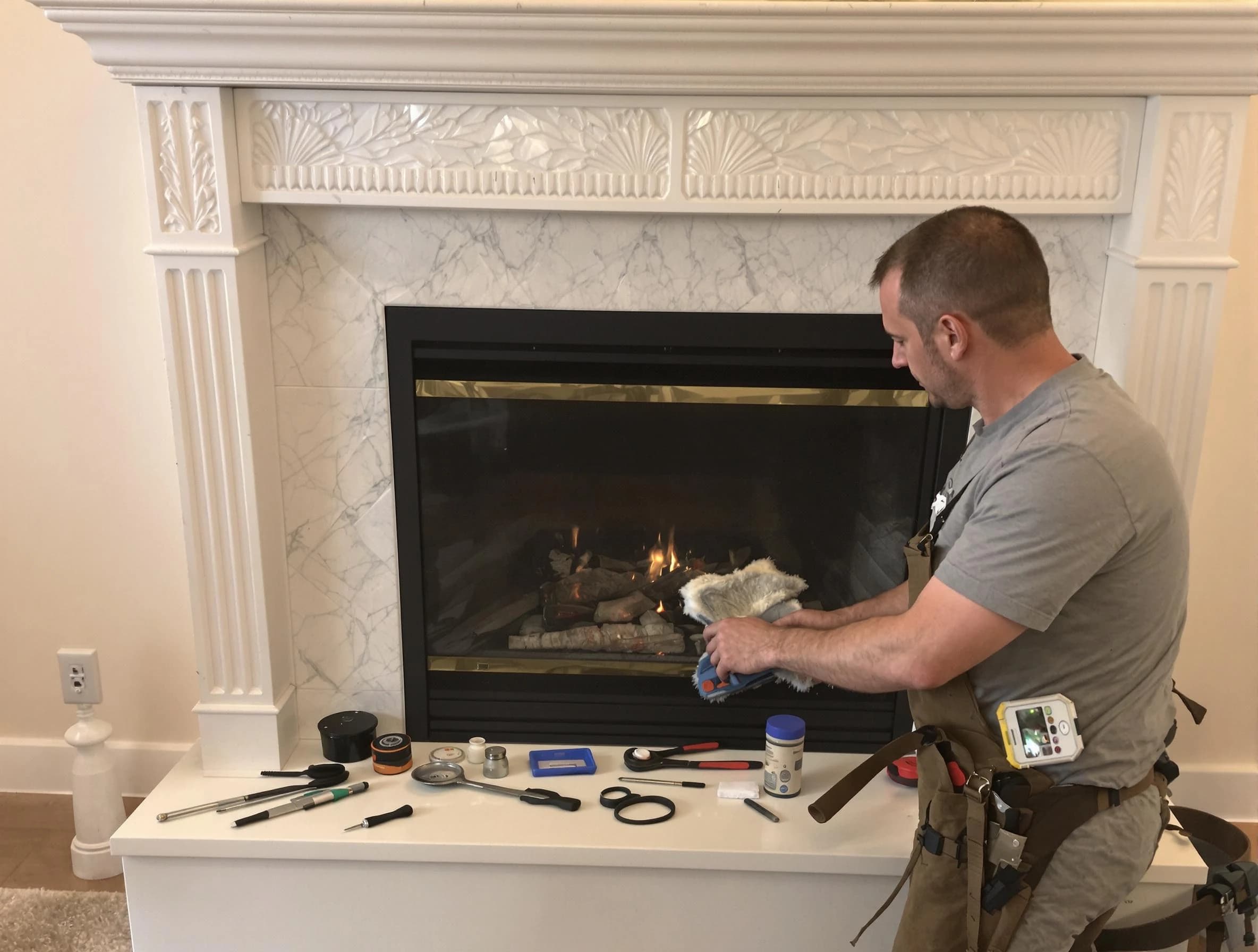 Livingston Chimney Sweep performing fireplace maintenance in Livingston, NJ
